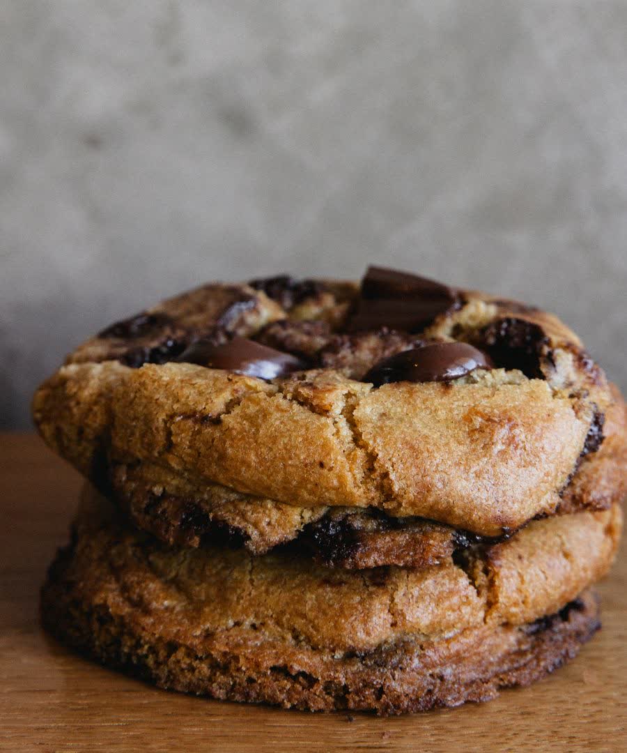 Stacked chocolate chip cookies.